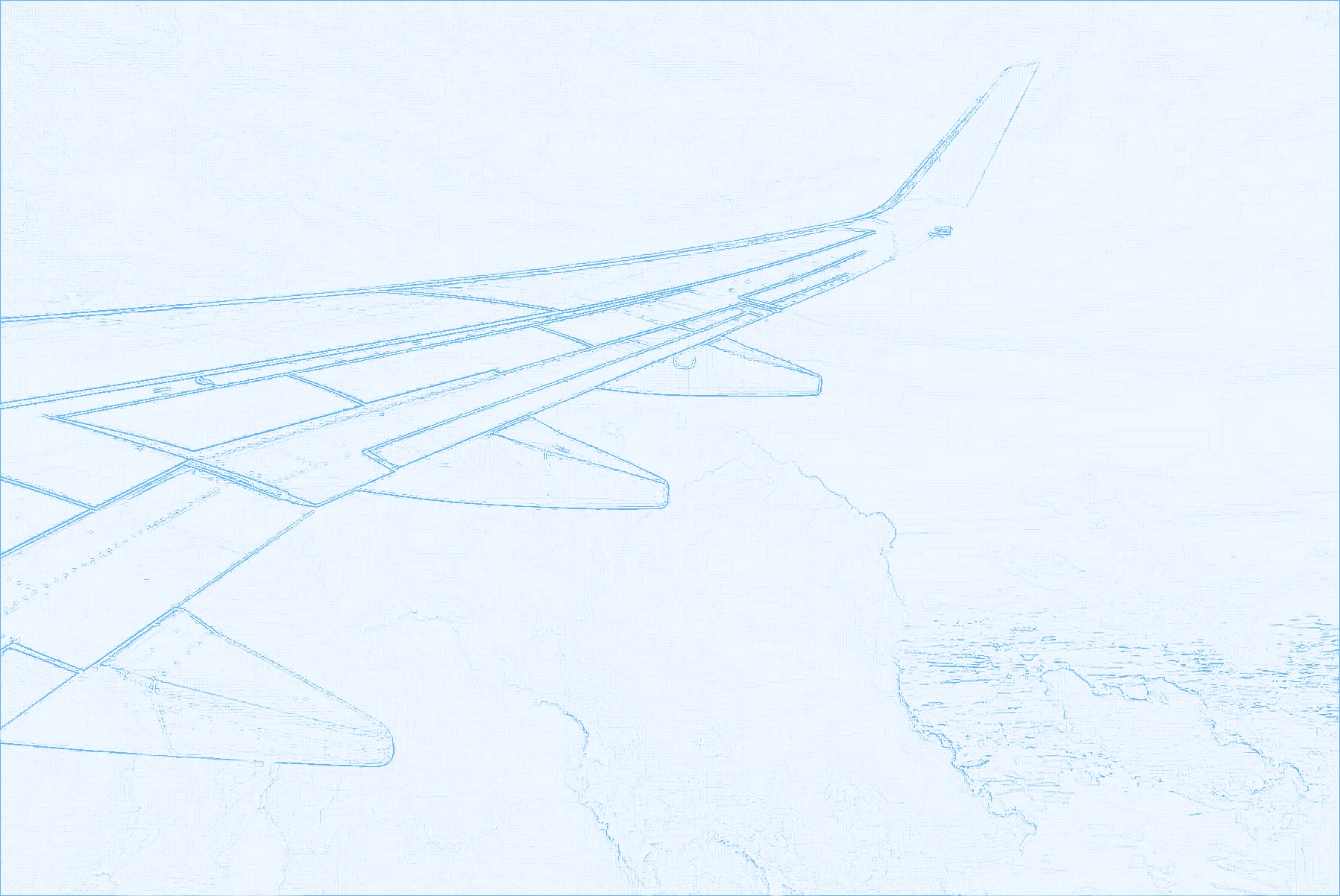 Airplane wing flying through clouds